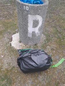 Household rubbish by rubbish bin at Bendigo