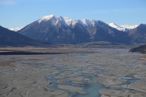 View across Rakaia River towards mountain ranges