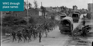 A New Zealand Battalion passing through recaptured Bapaume, World War I.