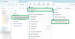 image of a downloads folder in file explorer. The TIFF file has been selected and the right-hand menu is open. "Open with" is highlighted and selected, and "Choose another app" in the sub menu is also highlighted.