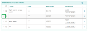 image highlighting the 6-dot icon at teh left of a row in a memorandum of easements table.