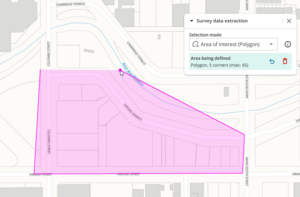 screenshot of the spatial screen with a pink polygon shape being drawn. The survey data extraction panel shows the area being defined has 5 corners.