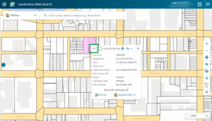 screenshot of Web Search spatial dispaly. A parcel is selected, and its info panel is open. The "collapse" arrow at the top left corner of the panel is highlighted.